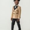 Front view of boys double-breasted beige and black wedding suit set