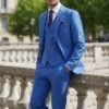 Men's blue three-piece 100% wool slim-fit suit with a two-button jacket, waistcoat and trousers