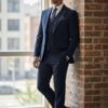 Men's navy three-piece 100% wool slim-fit suit with a two-button jacket, waistcoat and trousers